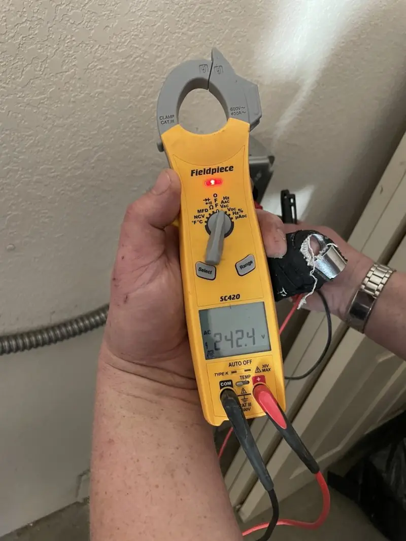 Voltage testing with clamp meter during Generator Installation in San Dimas